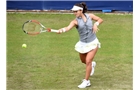 BIRMINGHAM, ENGLAND - JUNE 09:  Lauren Davis of United States returns a shot from Tamira Paszek of Austria on day one of the AEGON Classic Tennis Tournament at Edgbaston Priory Club on June 9, 2014 in Birmingham, England.  (Photo by Tom Dulat/Getty Images)